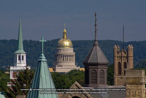 West Virginia State Capitol and church steeples in Charleston